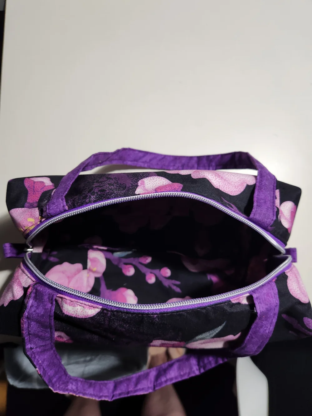 Purple Floral Cosmetic Bag with Black Background